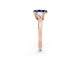 Rose gold Three-Stone Pear Cut Cut Diamond Ring with Trillion Side Stones and Four-Prong Setting_2