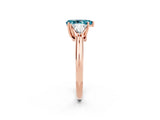 Rose gold Three-Stone Pear Cut Cut Diamond Ring with Trillion Side Stones and Four-Prong Setting_2