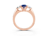 Rose gold Three-Stone Pear Cut Cut Diamond Ring with Trillion Side Stones and Four-Prong Setting_3