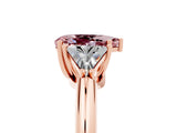 Rose gold Three-Stone Pear Cut Cut Diamond Ring with Trillion Side Stones and Four-Prong Setting_5