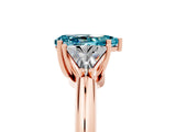 Rose gold Three-Stone Pear Cut Cut Diamond Ring with Trillion Side Stones and Four-Prong Setting_5