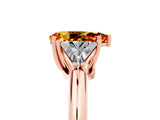 Rose gold Three-Stone Pear Cut Cut Diamond Ring with Trillion Side Stones and Four-Prong Setting_5