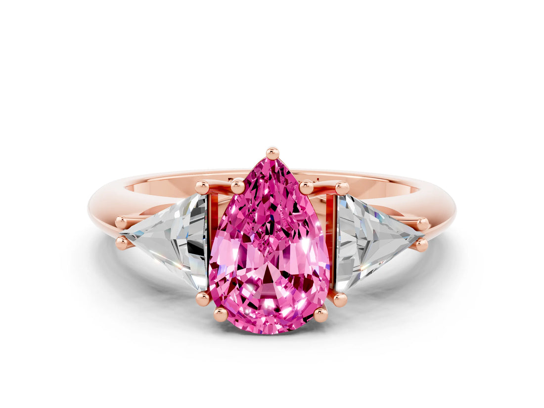 Rose gold Three-Stone Pear Cut Cut Diamond Ring with Trillion Side Stones and Four-Prong Setting