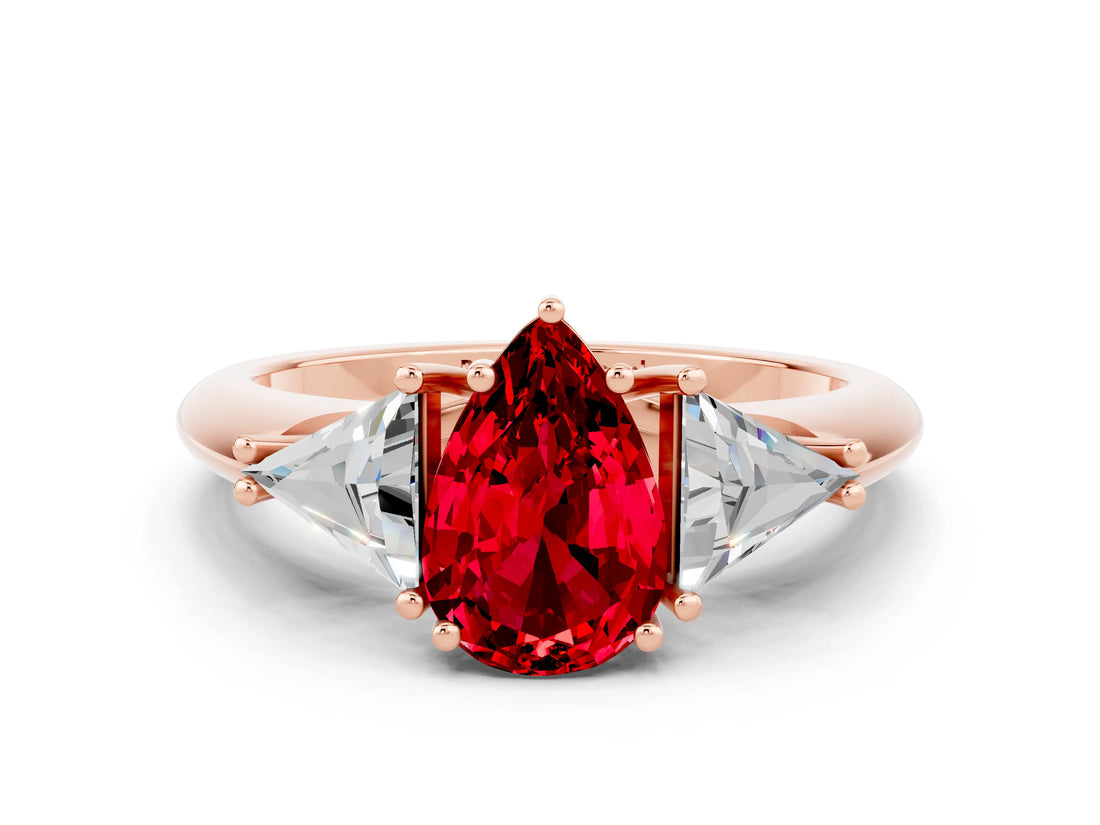 Rose gold Three-Stone Pear Cut Cut Diamond Ring with Trillion Side Stones and Four-Prong Setting
