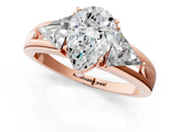 Rose gold Three-Stone Pear Cut Cut Diamond Ring with Trillion Side Stones on a Split Shank Band_14