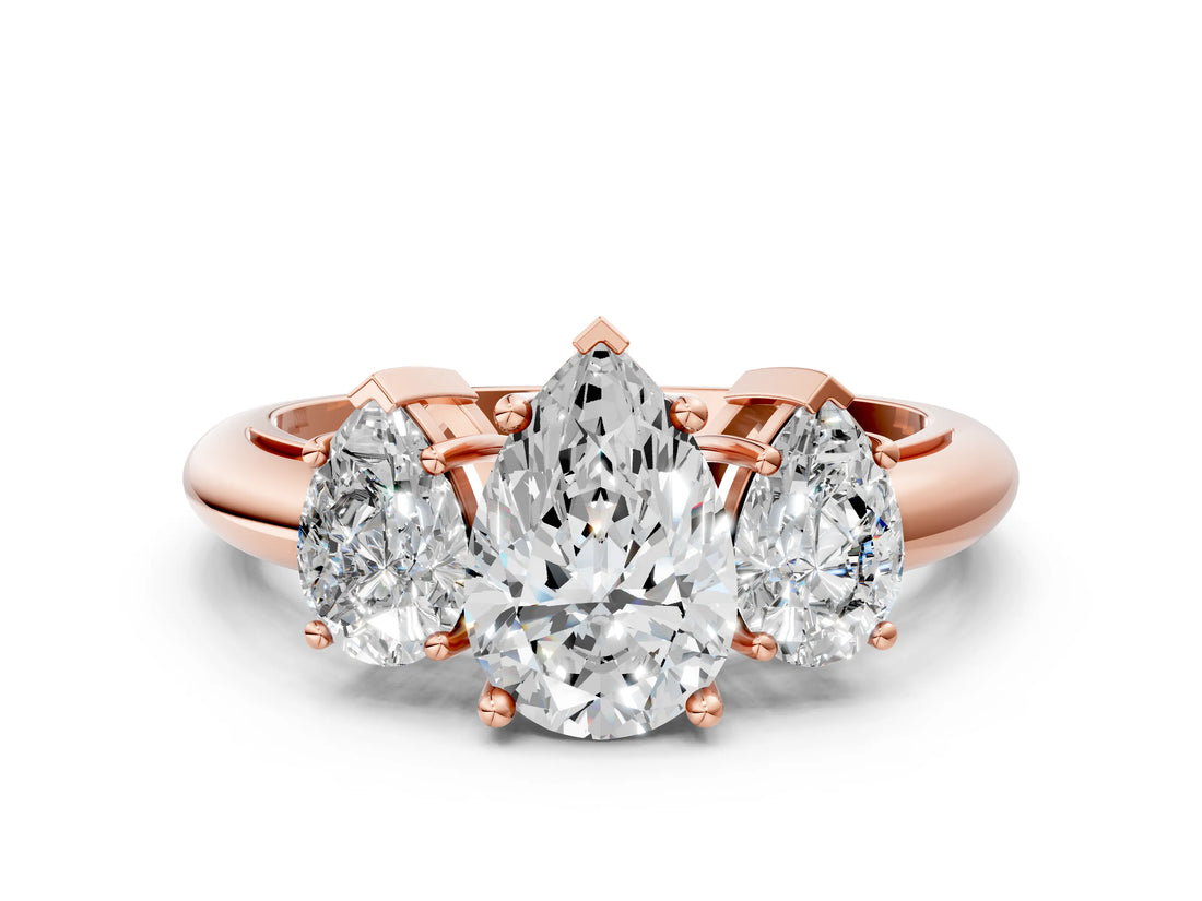 Rose gold Three-Stone Pear Cut Diamond Engagement Ring with Prong Setting on a White Gold Band_42