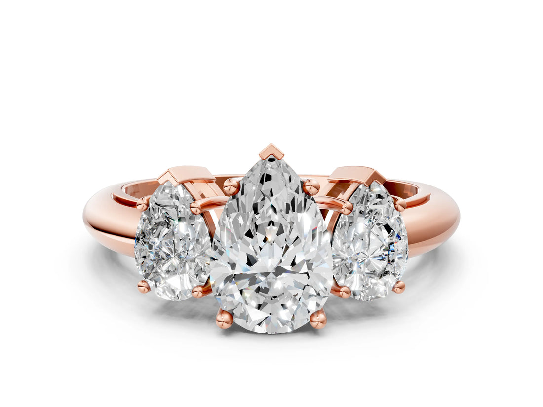 Rose gold Three-Stone Pear Cut Diamond Engagement Ring with Prong Setting on a White Gold Band_6
