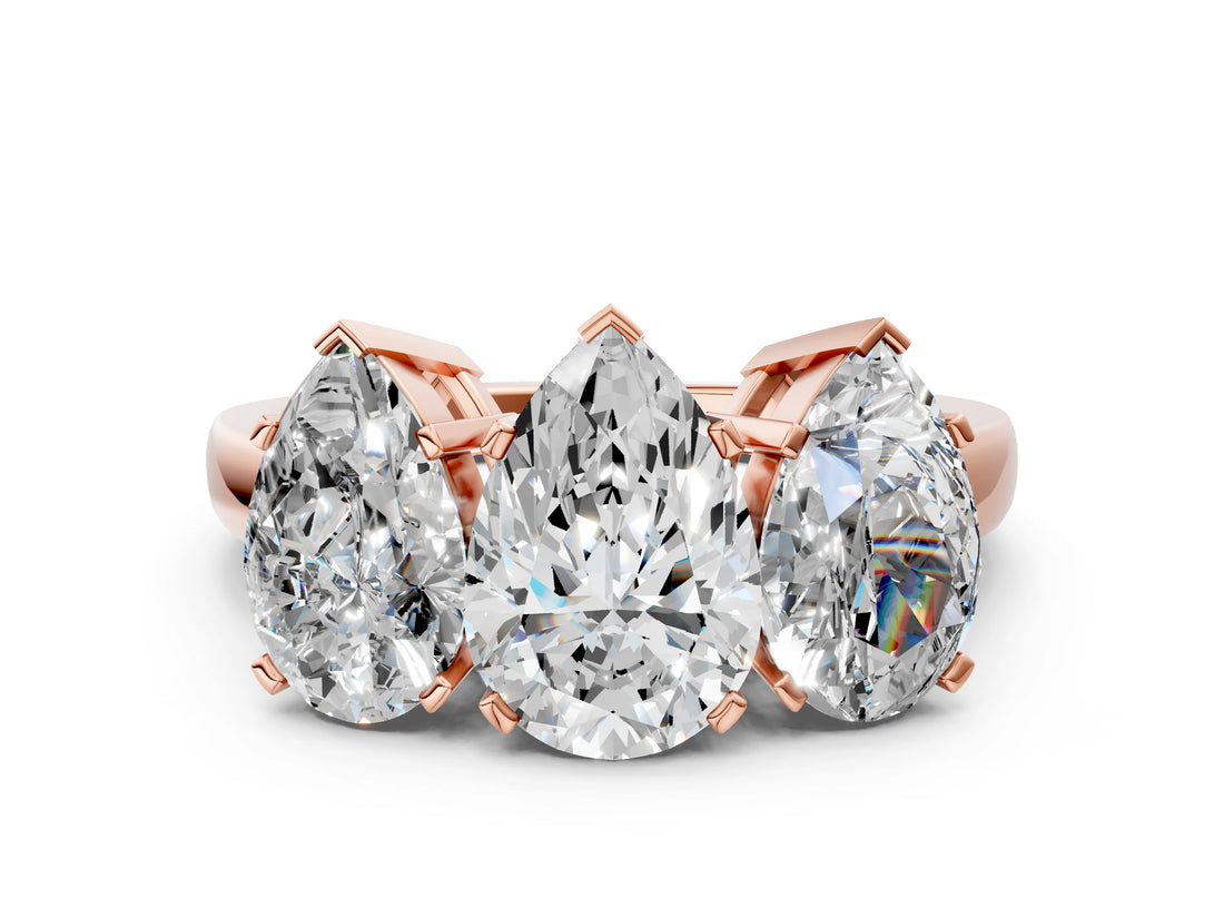Rose gold Three-Stone Pear Cut Diamond Ring with Channel Set Band and Four-Prong Setting_18