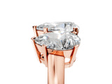 Rose gold Three-Stone Pear Cut Diamond Ring with Channel Set Band and Four-Prong Setting_23