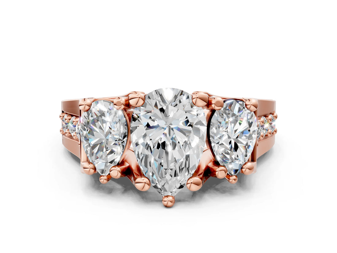 Rose gold Three-Stone Pear Cut Diamond Ring with Channel-Set Band and Four-Prong Setting_51