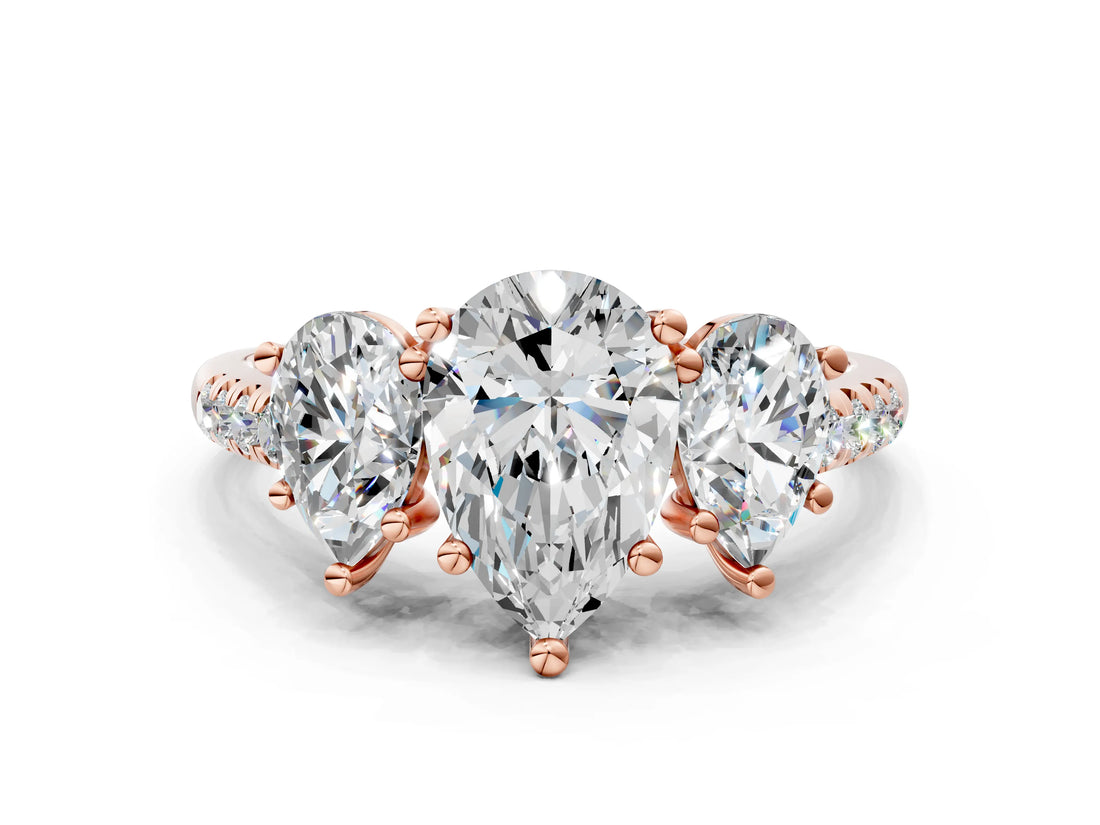 Rose gold Three-Stone Pear Cut Diamond Ring with Pavé Band and Prong Setting_89