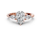 Rose gold Three-Stone Pear Cut Diamond Ring with Pear Side Stones in Four-Prong Setting_141