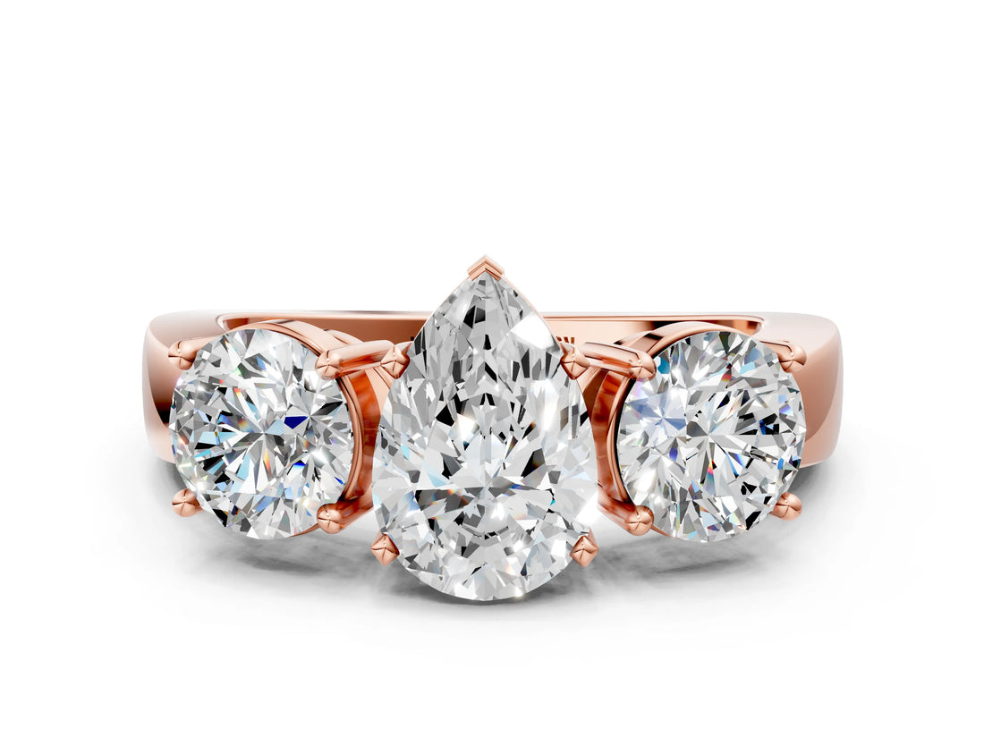 Rose gold Three-Stone Pear Cut Diamond Ring with Round Side Stones, Classic Band, and Four-Prong Setting_3