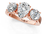 Rose gold Three-Stone Pear Cut Diamond Ring with Round Side Stones, Classic Band, and Four-Prong Setting_4