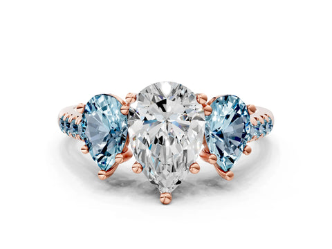 Rose gold Three-Stone Pear Cut Diamond Ring with Round with Aquamarine side stone Pavé Band and Prong Setting