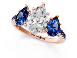 Rose gold Three-Stone Pear Cut Diamond Ring with Round with Blue Sapphire side stone Pavé Band and Prong Setting_1