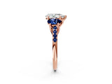Rose gold Three-Stone Pear Cut Diamond Ring with Round with Blue Sapphire side stone Pavé Band and Prong Setting_2