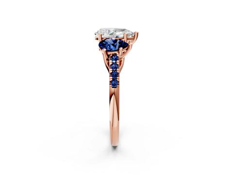 Rose gold Three-Stone Pear Cut Diamond Ring with Round with Blue Sapphire side stone Pavé Band and Prong Setting_2