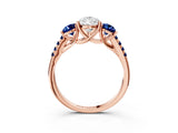 Rose gold Three-Stone Pear Cut Diamond Ring with Round with Blue Sapphire side stone Pavé Band and Prong Setting_3