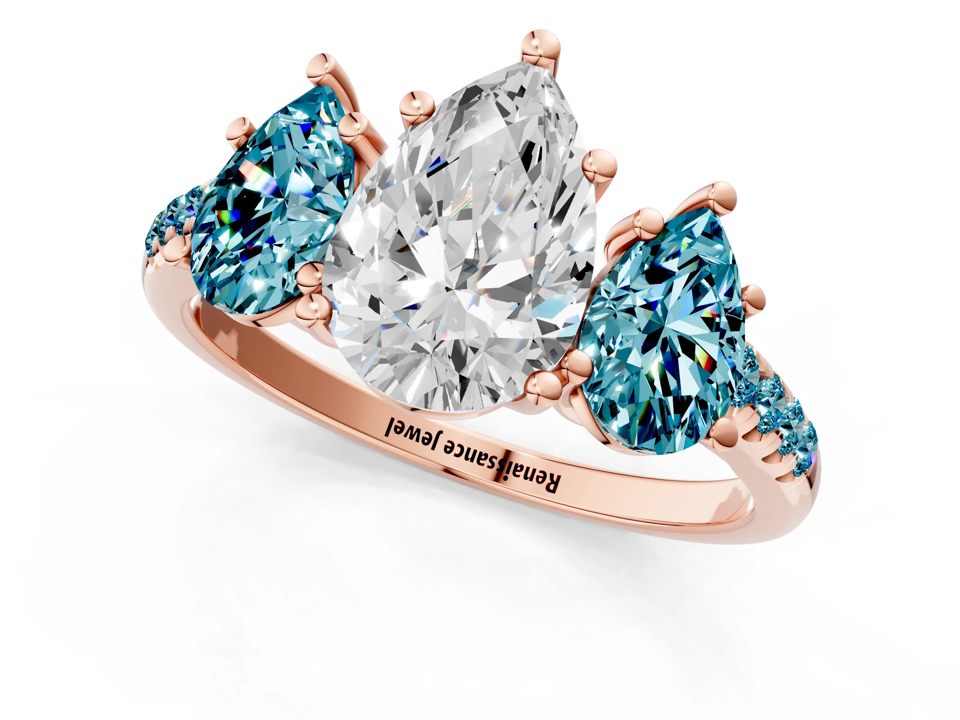 Rose gold Three-Stone Pear Cut Diamond Ring with Round with Blue Topaz side stone Pavé Band and Prong Setting_1
