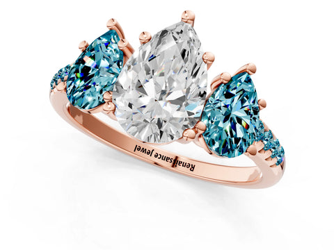 Rose gold Three-Stone Pear Cut Diamond Ring with Round with Blue Topaz side stone Pavé Band and Prong Setting_1