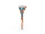 Rose gold Three-Stone Pear Cut Diamond Ring with Round with Blue Topaz side stone Pavé Band and Prong Setting_2