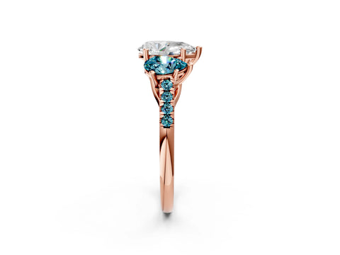 Rose gold Three-Stone Pear Cut Diamond Ring with Round with Blue Topaz side stone Pavé Band and Prong Setting_2