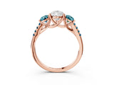 Rose gold Three-Stone Pear Cut Diamond Ring with Round with Blue Topaz side stone Pavé Band and Prong Setting_3