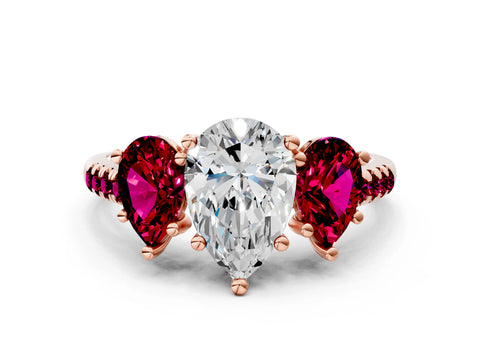 Rose gold Three-Stone Pear Cut Diamond Ring with Round with Garnet side stone Pavé Band and Prong Setting