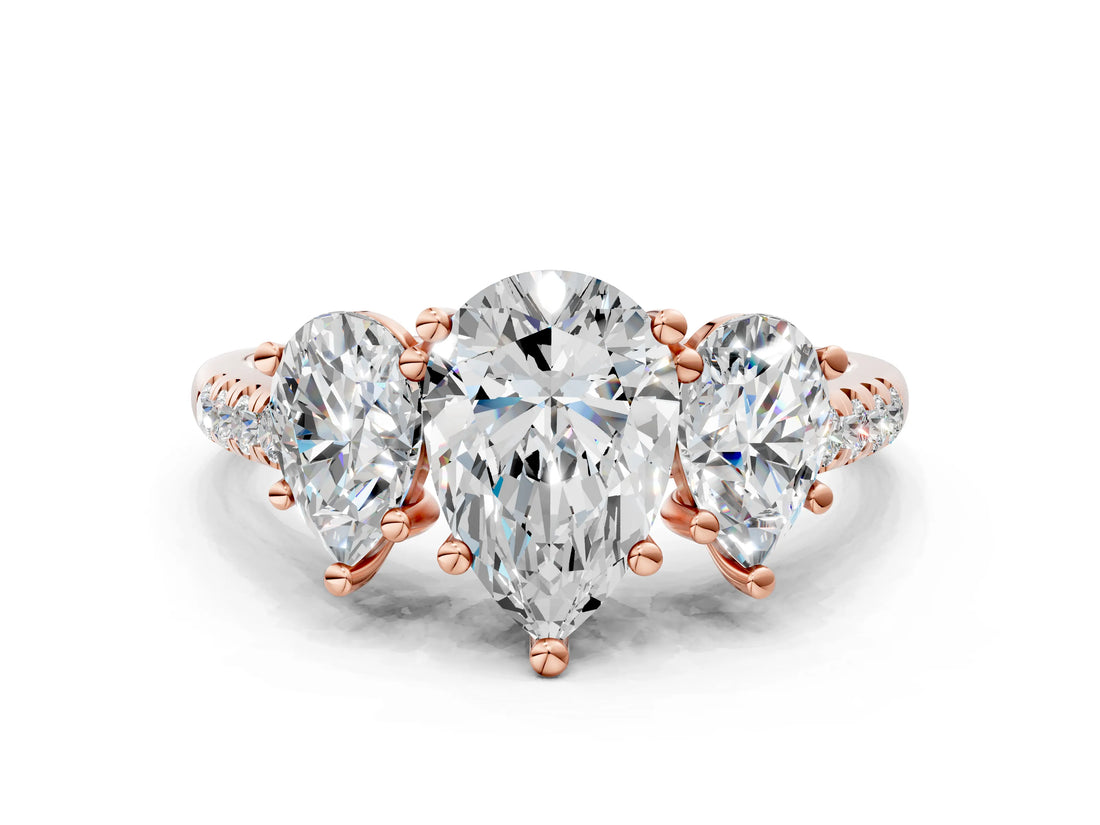Rose gold Three-Stone Pear Cut Diamond Ring with Round with Moissanite side stone Pavé Band and Prong Setting