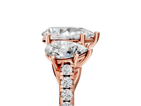 Rose gold Three-Stone Pear Cut Diamond Ring with Round with Moissanite side stone Pavé Band and Prong Setting_5