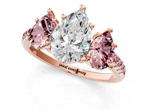Rose gold Three-Stone Pear Cut Diamond Ring with Round with Morganite side stone Pavé Band and Prong Setting_1