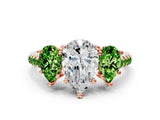 Rose gold Three-Stone Pear Cut Diamond Ring with Round with Peridot side stone Pavé Band and Prong Setting