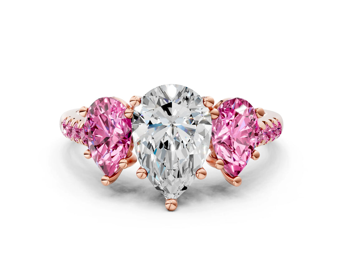 Rose gold Three-Stone Pear Cut Diamond Ring with Round with Pink Sapphire side stone Pavé Band and Prong Setting