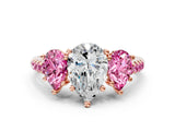 Rose gold Three-Stone Pear Cut Diamond Ring with Round with Pink Sapphire side stone Pavé Band and Prong Setting