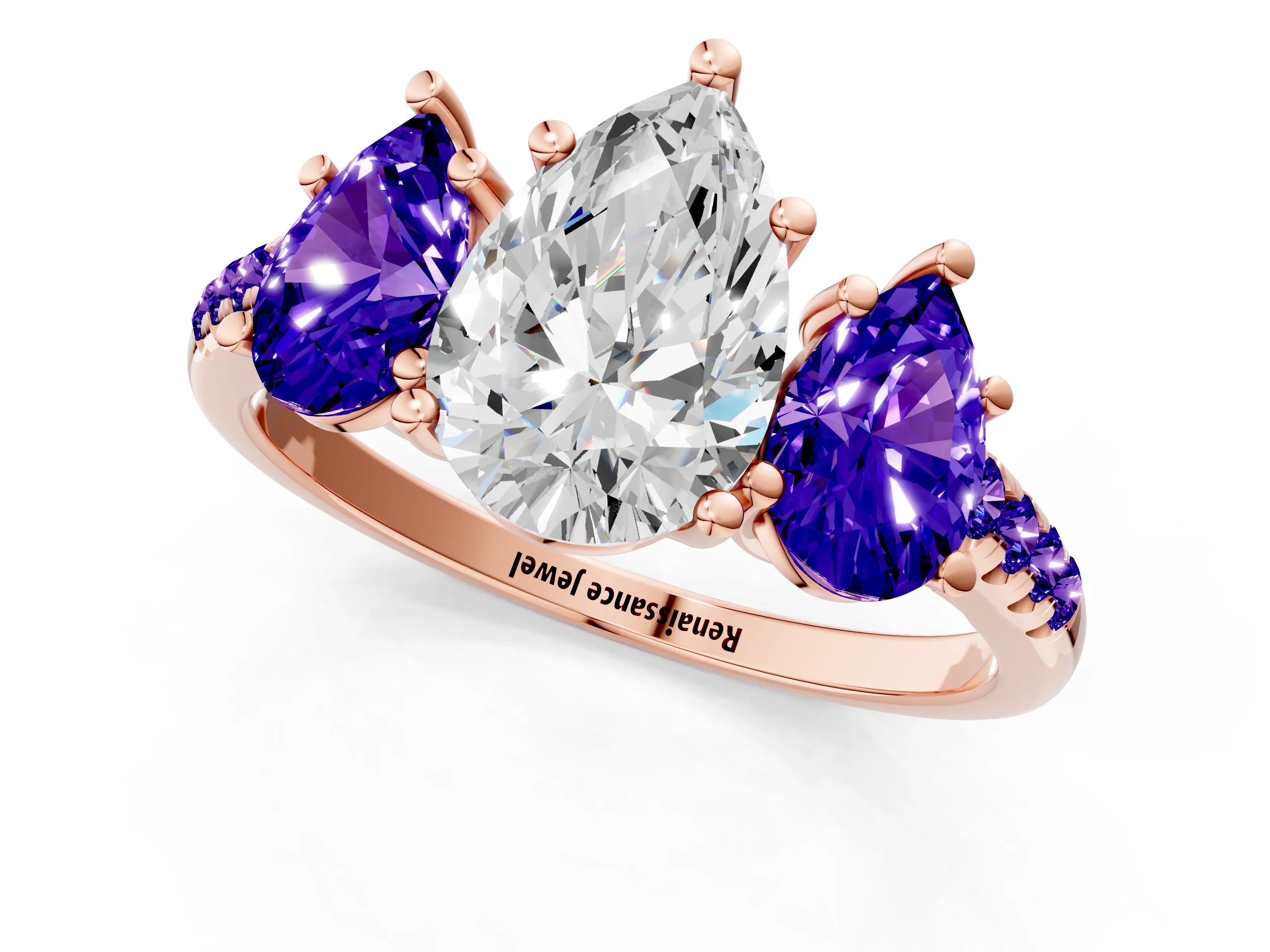 Rose gold Three-Stone Pear Cut Diamond Ring with Round with Tanzanite side stone Pavé Band and Prong Setting_1
