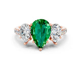 Rose gold Three-Stone Pear Cut Emerald Ring with Pavé Band and Prong Setting_12