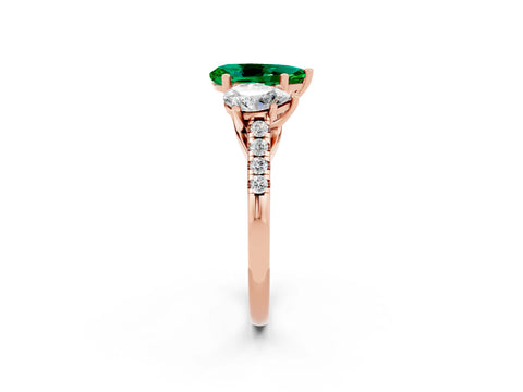 Rose gold Three-Stone Pear Cut Emerald Ring with Pavé Band and Prong Setting_14