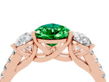 Rose gold Three-Stone Pear Cut Emerald Ring with Pavé Band and Prong Setting_16