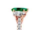 Rose gold Three-Stone Pear Cut Emerald Ring with Pavé Band and Prong Setting_17