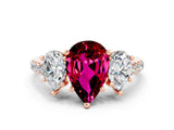 Rose gold Three-Stone Pear Cut Garnet Ring with Pavé Band and Prong Setting_12