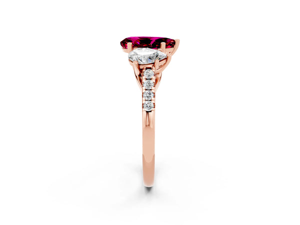 Rose gold Three-Stone Pear Cut Garnet Ring with Round  Pavé Band and Prong Setting