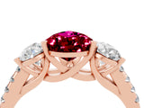 Rose gold Three-Stone Pear Cut Garnet Ring with Pavé Band and Prong Setting_16