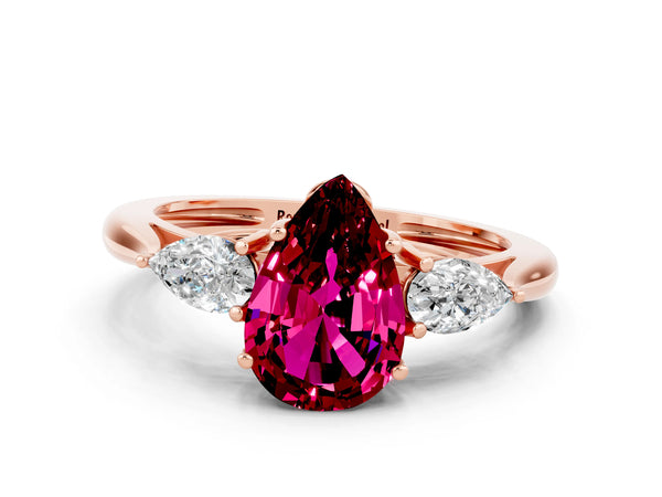 Rose gold Three-Stone Pear Cut Garnet Ring with Pear  Side Stones in Four-Prong Setting