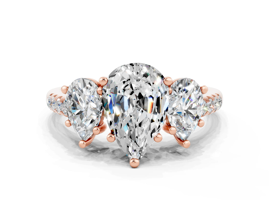 Rose gold Three-Stone Pear Cut Moissanite Ring with Pavé Band and Prong Setting_12