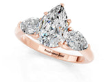 Rose gold Three-Stone Pear Cut Moissanite Ring with Pear Side Stones and Four-Prong Setting_1