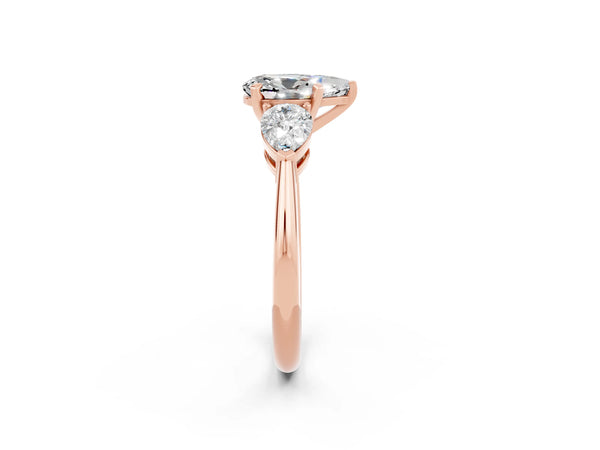 Rose gold Three-Stone Pear Cut Moissanite Ring with Pear Side Stones and Four-Prong Setting
