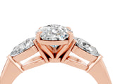 Rose gold Three-Stone Pear Cut Moissanite Ring with Pear Side Stones and Four-Prong Setting_4