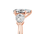 Rose gold Three-Stone Pear Cut Moissanite Ring with Pear Side Stones and Four-Prong Setting_5