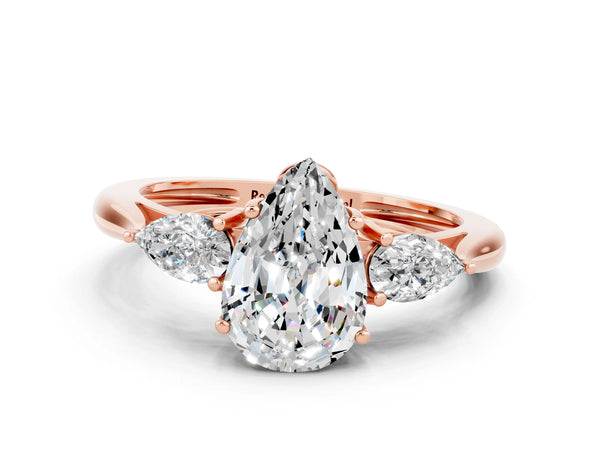 Rose gold Three-Stone Pear Cut Moissanite Ring with Pear  Side Stones in Four-Prong Setting